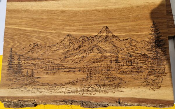Pyrogravure "chalet au pied des alpes"