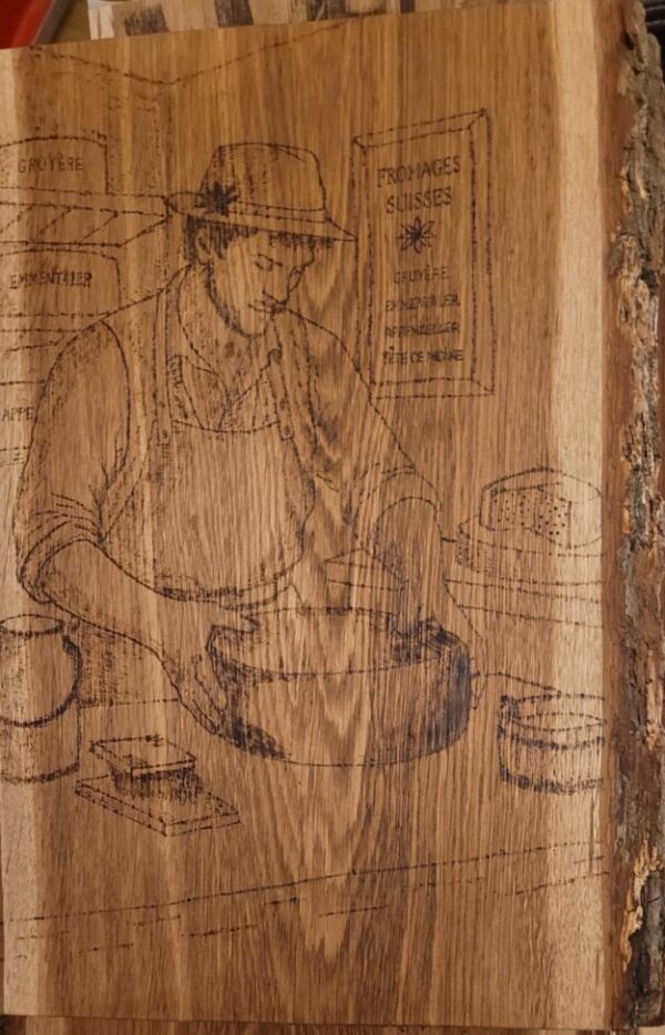 Pyrogravure d'un fromager d'alpage